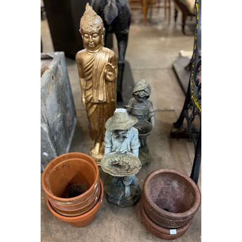 258 - Two resin garden figures, one of a boy and one of a girl,  seven terracotta plant pots and a gilt fi... 