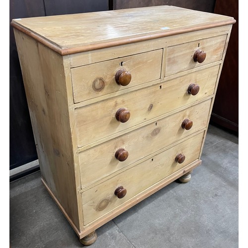 130 - A Victorian waxed pine chest of drawers