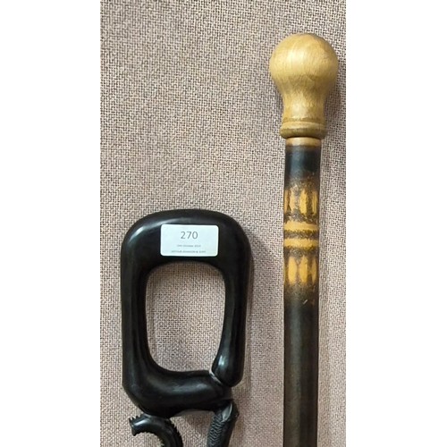 282 - An African ebony walking stick and one other