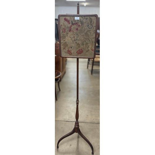 183 - A Victorian mahogany and embroidered pole screen