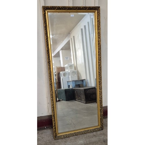 303 - A large French style gilt framed mirror, 168 x 73cms