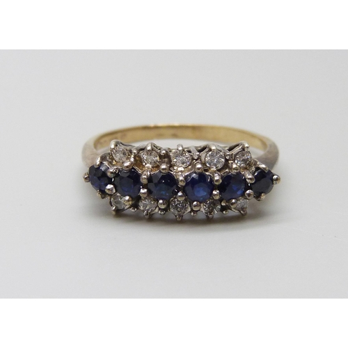 1001 - A 9ct gold six sapphire and ten diamond ring, 3g, P