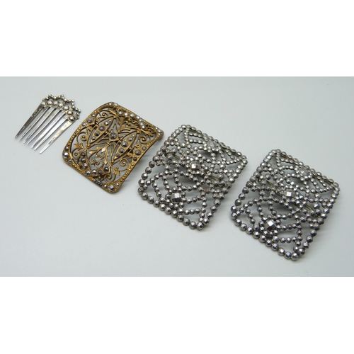 1002 - A pair of French cut steel buckles and one other, together with a comb marked 900