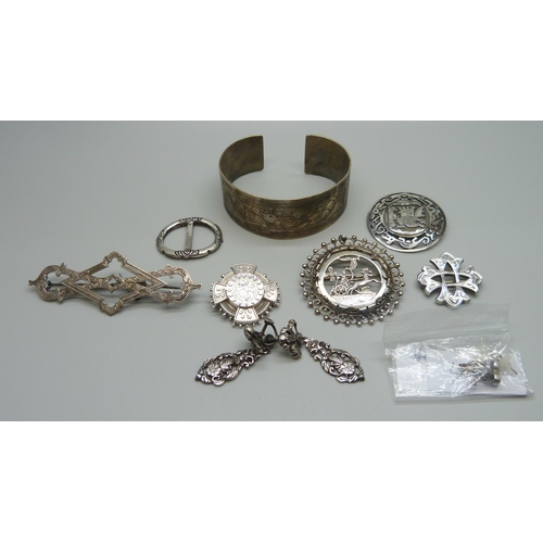 1017 - A collection of silver and white metal jewellery including a bangle marked 800, silver brooches, sil... 