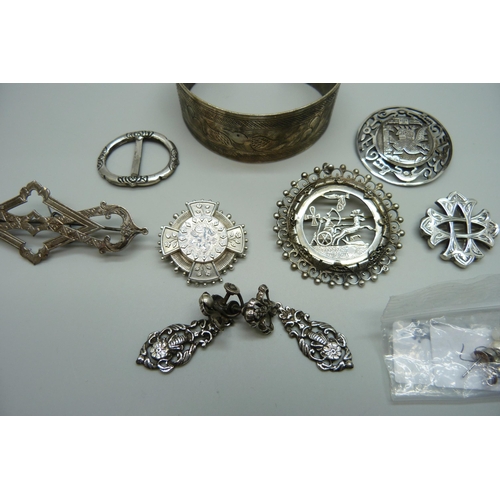 1017 - A collection of silver and white metal jewellery including a bangle marked 800, silver brooches, sil... 