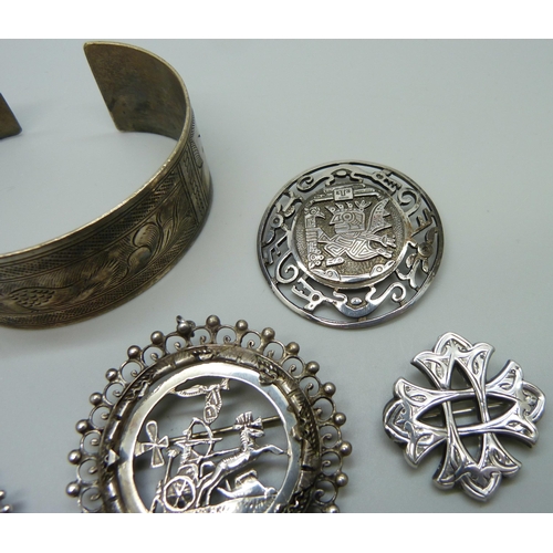 1017 - A collection of silver and white metal jewellery including a bangle marked 800, silver brooches, sil... 