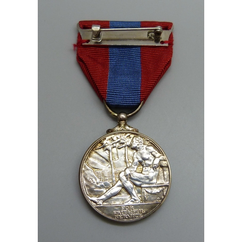 1018 - An Imperial Service medal, For Faithful Service, Douglas Raymond Smith, with a dog tag, D. Smith