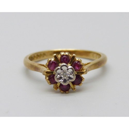 1029 - An 18ct gold, ruby and diamond ring, 3.1g, M