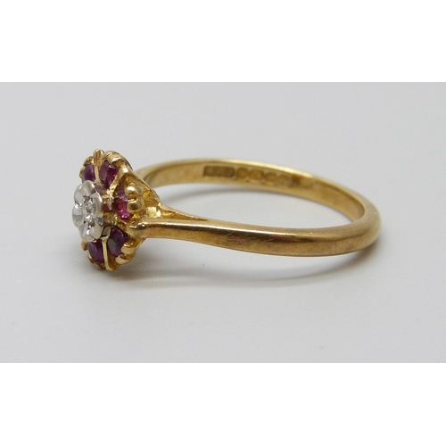 1029 - An 18ct gold, ruby and diamond ring, 3.1g, M