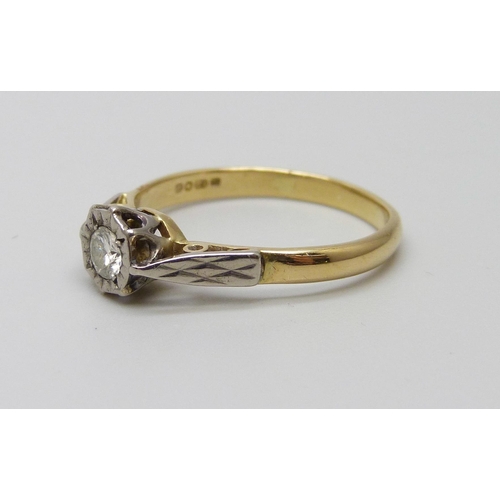 1032 - An 18ct gold illusion set diamond solitaire ring, 2.6g, N