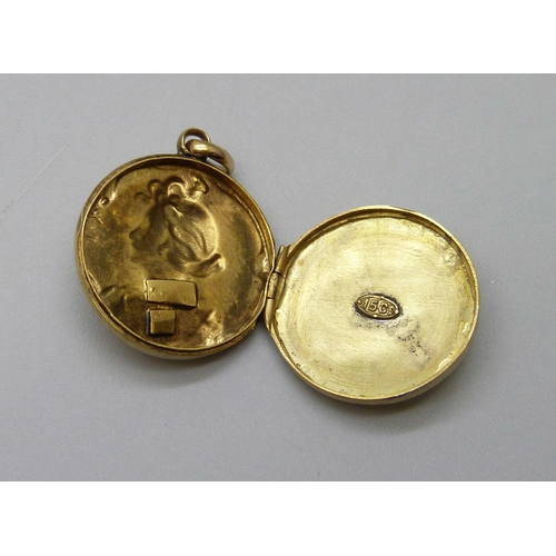 1036 - A 15ct gold Art Nouveau diamond set locket, 3.2g, 1.8cm