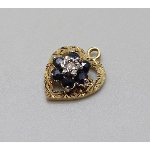 1038 - A diamond and sapphire heart shape pendant, 0.8g, 1.2cm