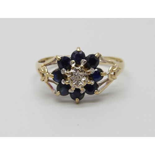 1047 - A 9ct gold sapphire and diamond ring, 1.2g, L