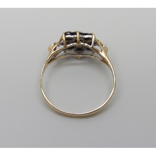 1047 - A 9ct gold sapphire and diamond ring, 1.2g, L