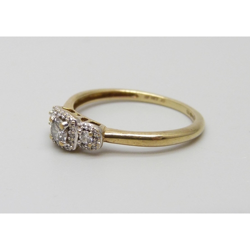 1051 - A 9ct gold and diamond cluster ring, 1.5g, M