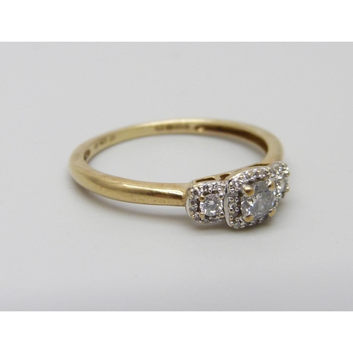 1051 - A 9ct gold and diamond cluster ring, 1.5g, M