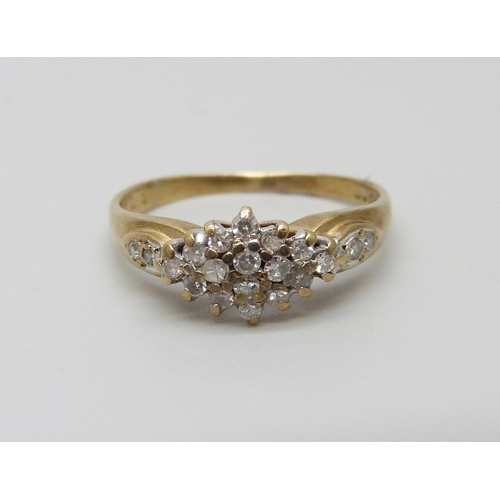 1058 - A 9ct gold and diamond cluster ring, 2.2g, O