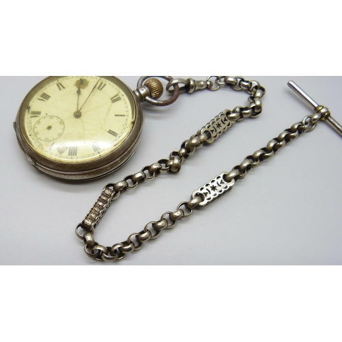 1061 - A silver pocket watch, London 1919, and a fancy link Albert chain