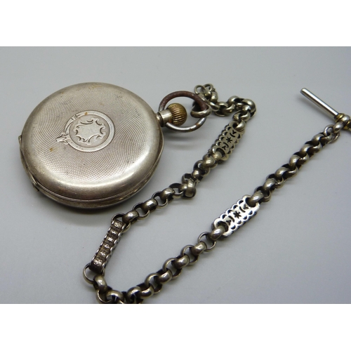 1061 - A silver pocket watch, London 1919, and a fancy link Albert chain