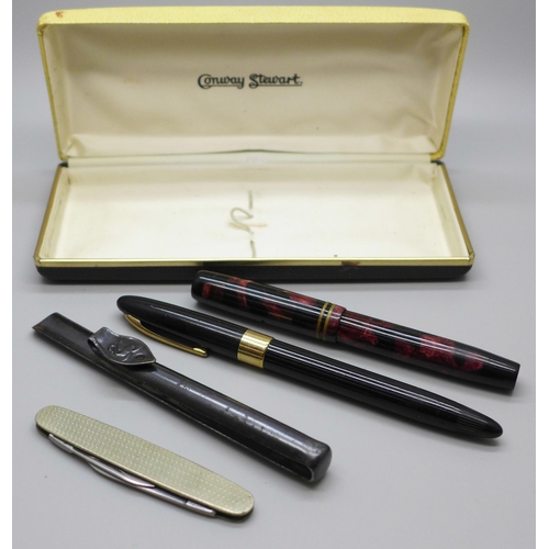 1083 - A Sheaffer fountain pen, a Parker fountain pen with 14k gold nib (personalised), a Swan clip and a p... 