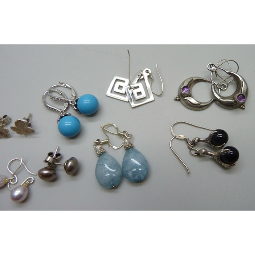 1087 - A collection of silver earrings including pearls, 32g total