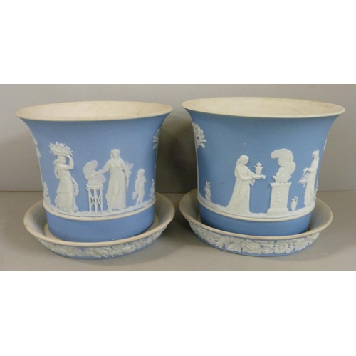 604 - A pair of Wedgwood blue jasper planters with saucers, 9cm