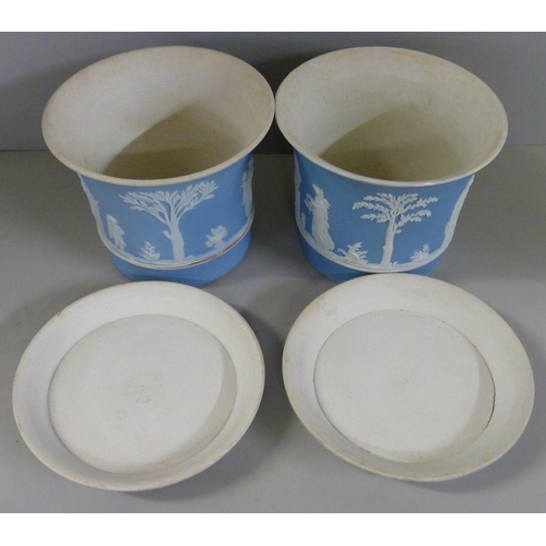 604 - A pair of Wedgwood blue jasper planters with saucers, 9cm