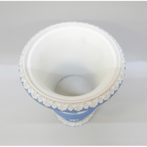 608 - A Wedgwood blue jasper twin handled urn with pierced cover, 21.5cm