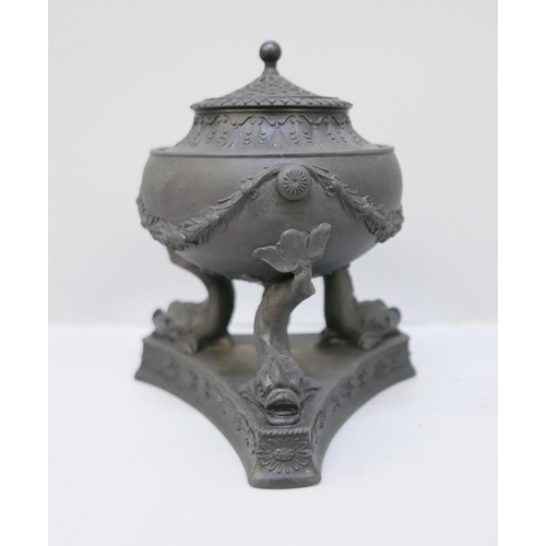 613 - A Wedgwood black basalt pastille burner, on a tripod stand with dolphin legs, 13.5cm