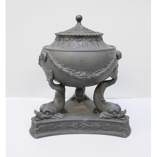 613 - A Wedgwood black basalt pastille burner, on a tripod stand with dolphin legs, 13.5cm