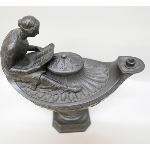 616 - A Wedgwood black basalt vestal oil lamp and cover, the female figure reading a book seated upon the ... 