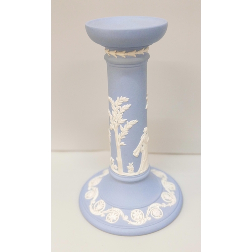 622 - A Wedgwood blue jasper dish, a/f, chip to rim, a single blue jasper candlestick and a pair of black ... 