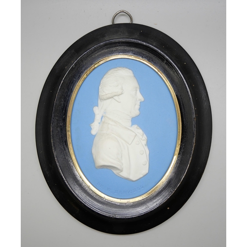 623 - A Wedgwood blue jasper oval medallion, Dr W Hershel in profile, framed