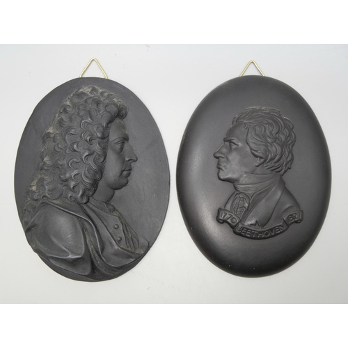 629 - A Wedgwood black basalt oval plaque of Beethoven and one other gentleman, both in profile