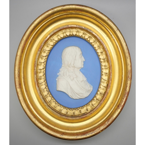 631 - A Wedgwood blue jasper oval plaque of John Milton in profile in a gilt oval frame, possible 18th cen... 