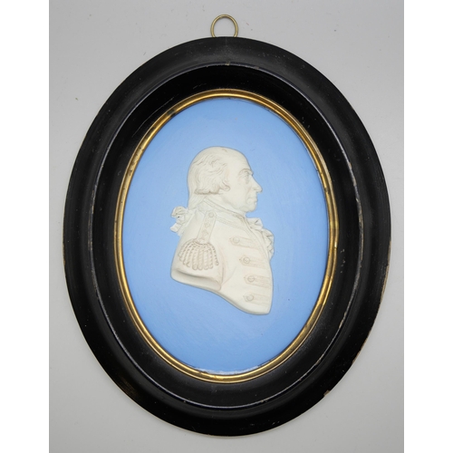 632 - A Wedgwood blue jasper oval plaque of Admiral Earl Howe in profile in an ebonised frame, frame 17cm ... 