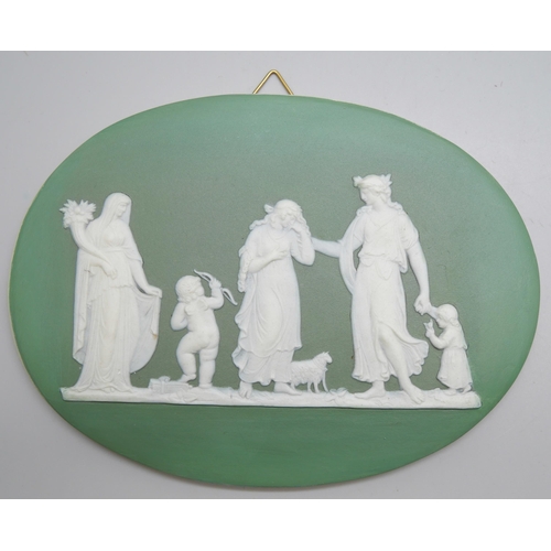 649 - Four Wedgwood green jasper plaques of classical maidens