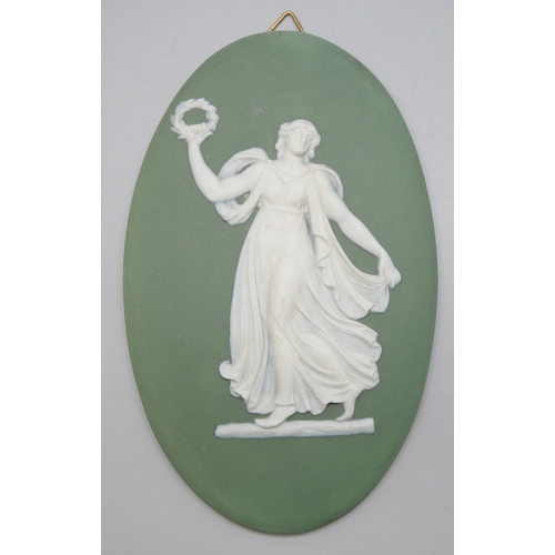 649 - Four Wedgwood green jasper plaques of classical maidens