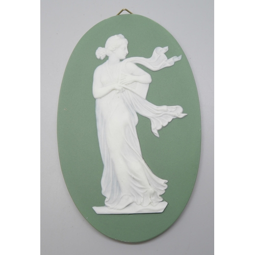 649 - Four Wedgwood green jasper plaques of classical maidens