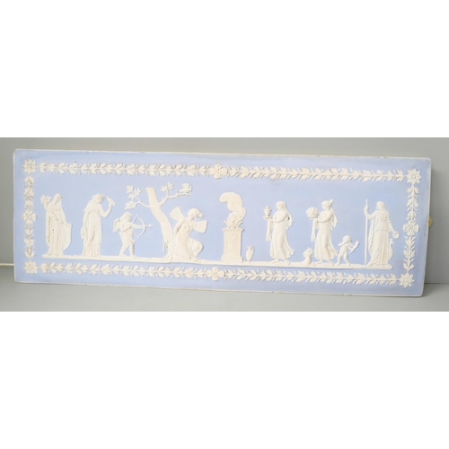 651 - A 19th Century blue and white jasper rectangular plaque, decorated with classical maidens, 46cm x 15... 