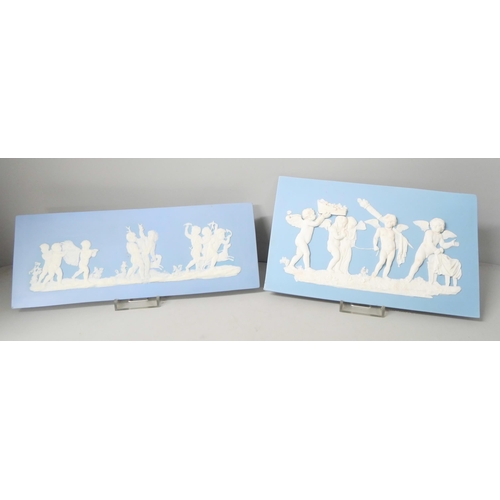 654 - Four Wedgwood jasper rectangular plaques of Putti