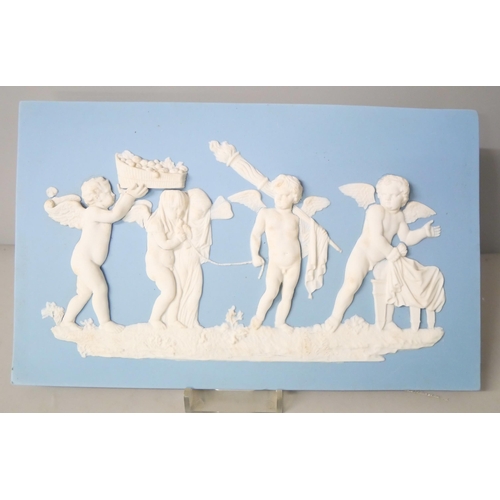 654 - Four Wedgwood jasper rectangular plaques of Putti