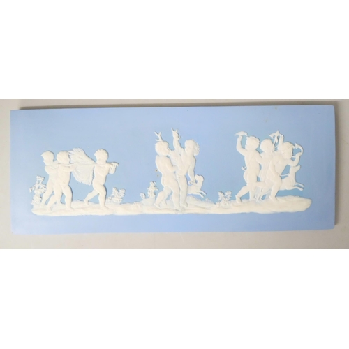 654 - Four Wedgwood jasper rectangular plaques of Putti