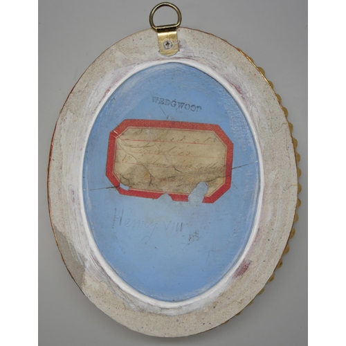 655 - A Wedgwood blue and white oval medallion, Henry VIII, a/f in a gilded frame