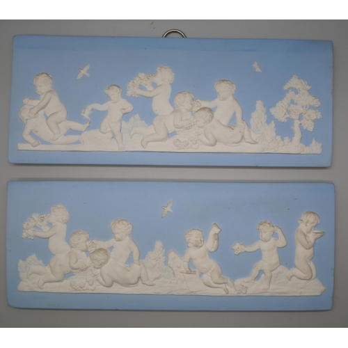 659 - Two 19th Century Wedgwood jasper rectangular plaques of cherubs eating bunches of grapes amongst bir... 