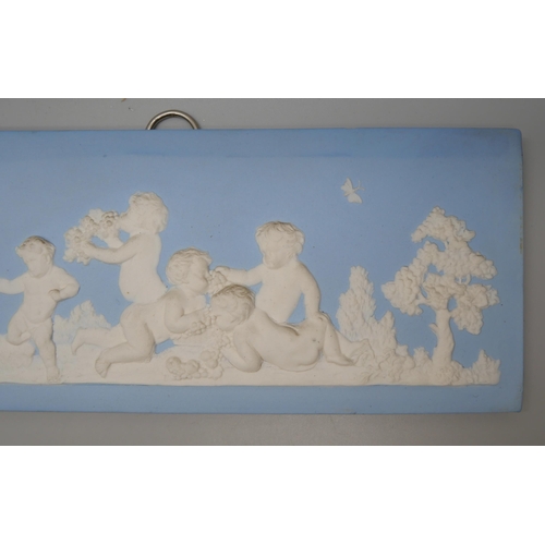 659 - Two 19th Century Wedgwood jasper rectangular plaques of cherubs eating bunches of grapes amongst bir... 