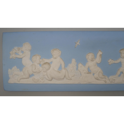 659 - Two 19th Century Wedgwood jasper rectangular plaques of cherubs eating bunches of grapes amongst bir... 