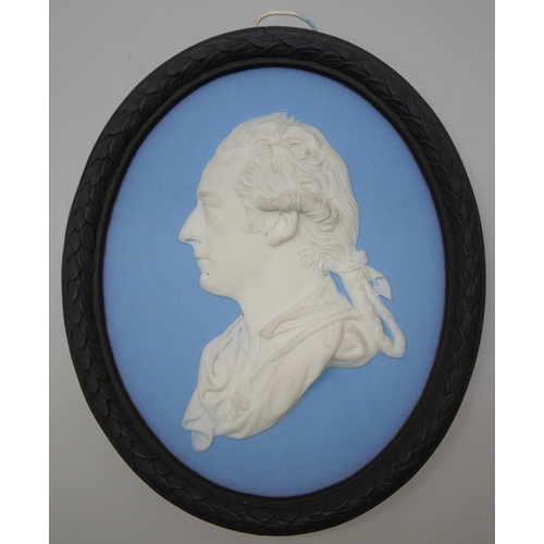 660 - Two Wedgwood blue jasper oval medallions, Mr Wyatt and one other, in profile