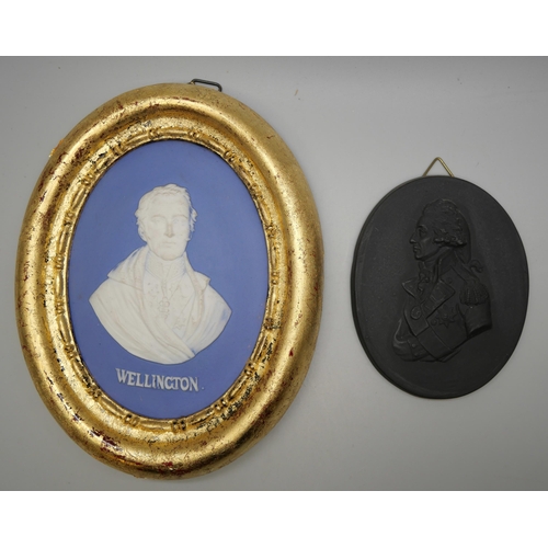 664 - Two Wedgwood black, white and blue jasper oval medallions, Nelson modelled by John Devrere 1798 and ... 