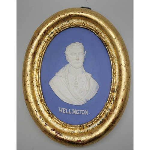 664 - Two Wedgwood black, white and blue jasper oval medallions, Nelson modelled by John Devrere 1798 and ... 